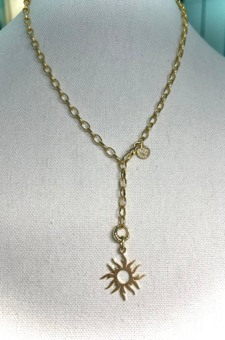IFI BIJOUX SOLENE necklace — medium oval-link gold-filled chain with blazing sun charm. Grace in Motion. Glamour on Arrival.