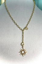 IFI BIJOUX SOLENE necklace — medium oval-link gold-filled chain with blazing sun charm. Grace in Motion. Glamour on Arrival.