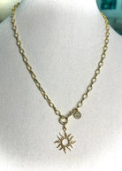 IFI BIJOUX SOLENE necklace — medium oval-link gold-filled chain with blazing sun charm. Grace in Motion. Glamour on Arrival.