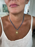 Shop the NOVA necklace from IFI BIJOUX — a bold blue enamel box chain with gold-filled Evil Eye medallions and turquoise drop charm. Adjustable 18"–20". Handmade, travel-inspired luxury. Grace in motion. Glamour on arrival.